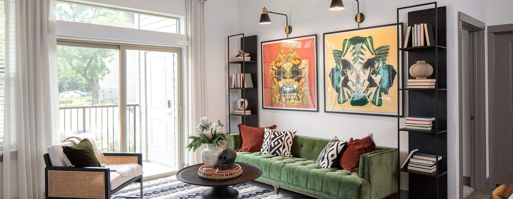 Spacious living room with floor to ceiling windows