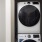 Stacked washer and dryer units