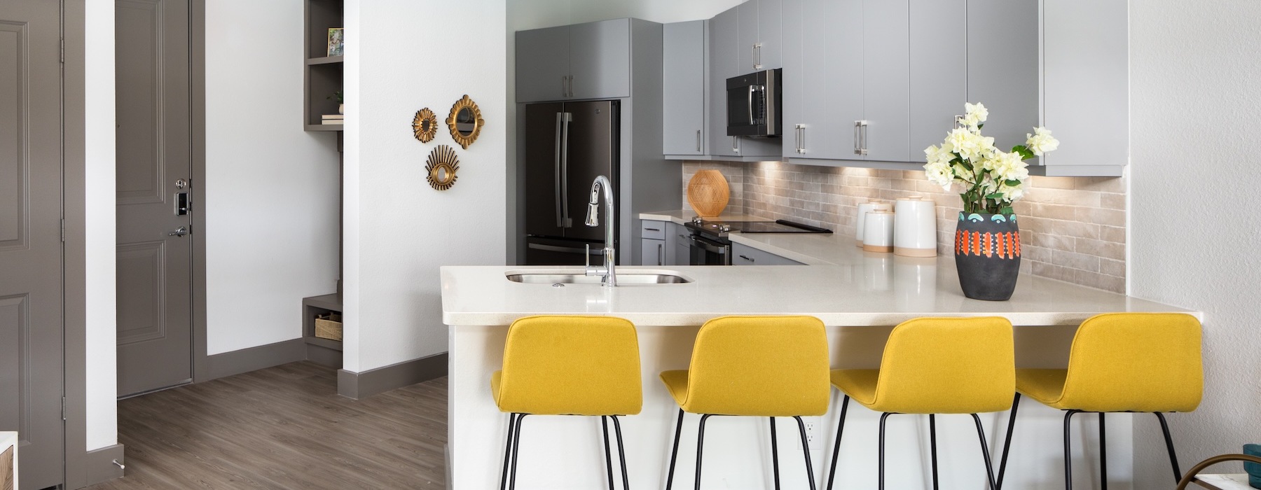 kitchen with bright lighting and ample counter space